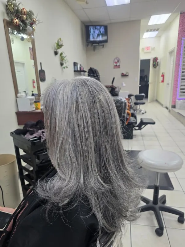 Client hair after gray blending to soft silver