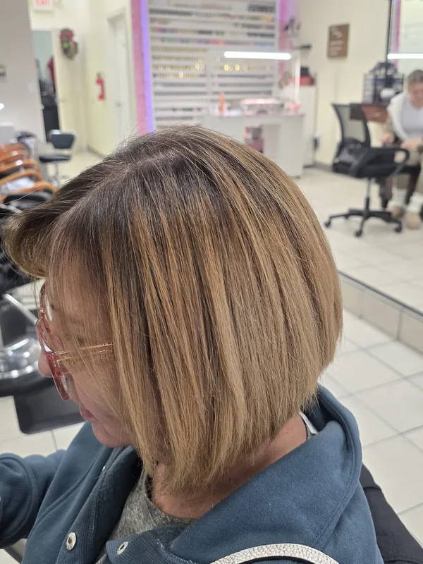 Client hair after color correction and bob cut